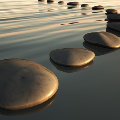 An image of some step stones to the sunset